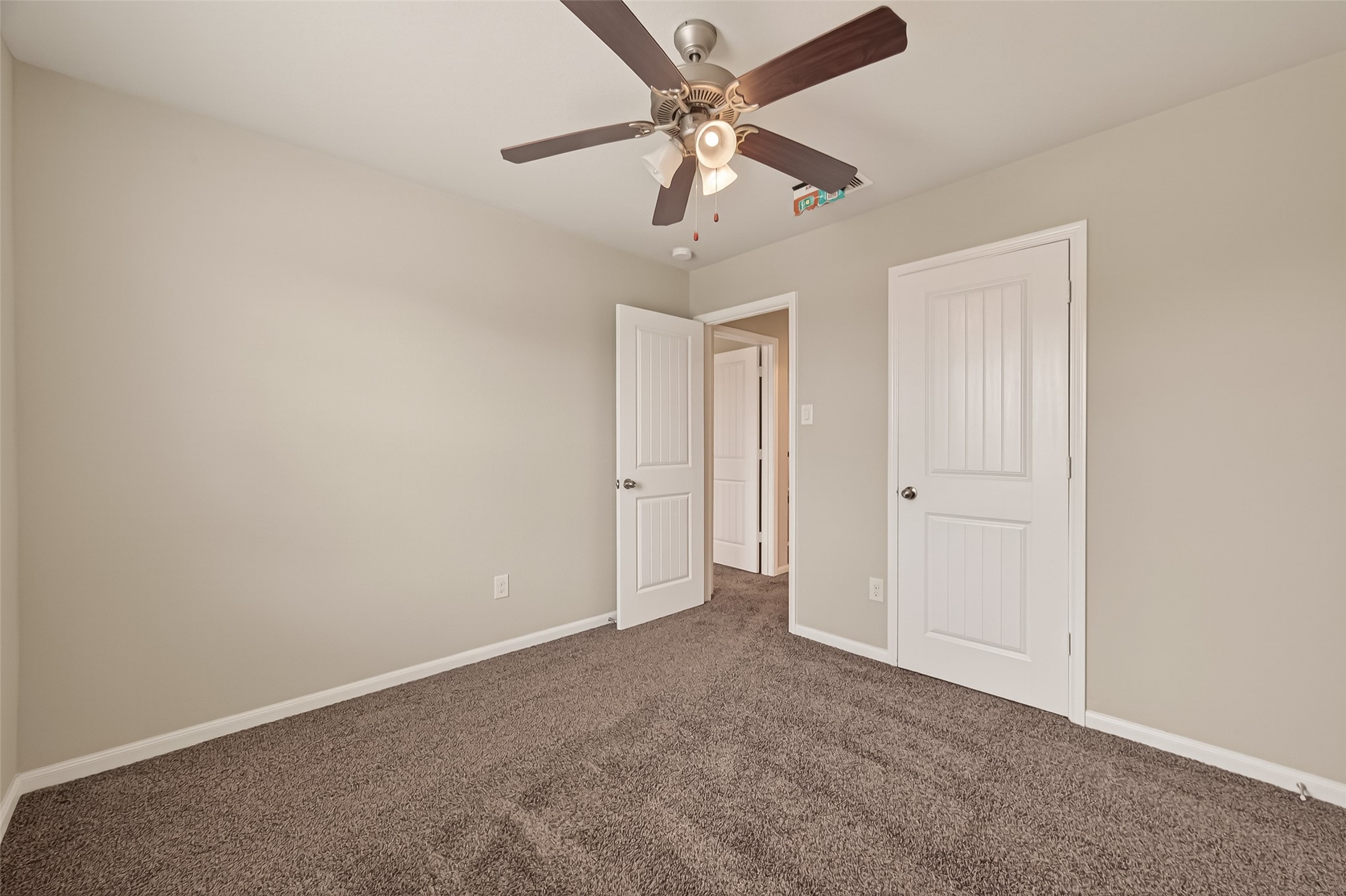 2510 Meerstad Lane Houston, TX 77047 - Photo 26 of 49 a view of an empty room and a ceiling fan