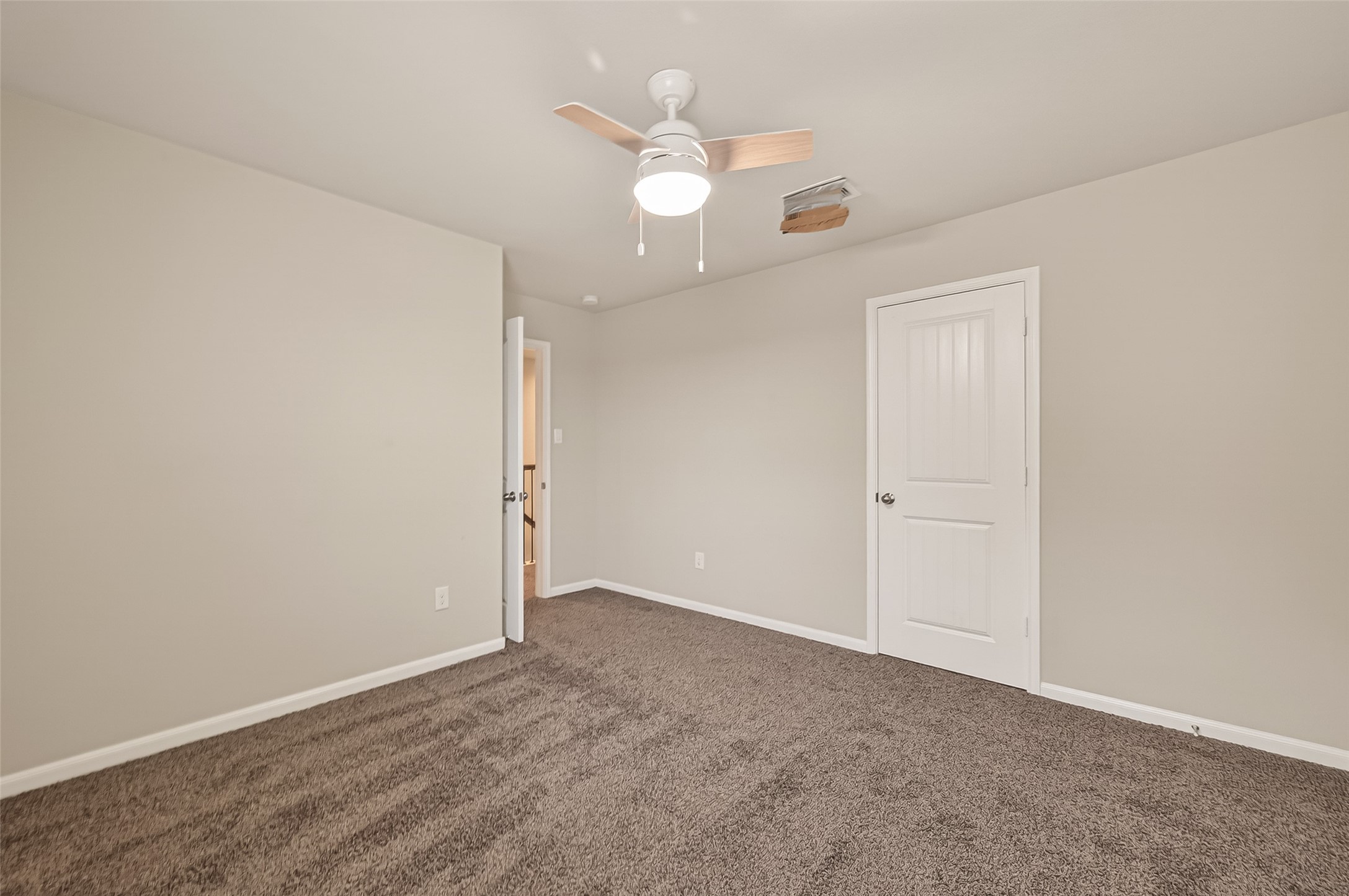 2510 Meerstad Lane Houston, TX 77047 - Photo 29 of 49 an empty room with a ceiling fan and a window