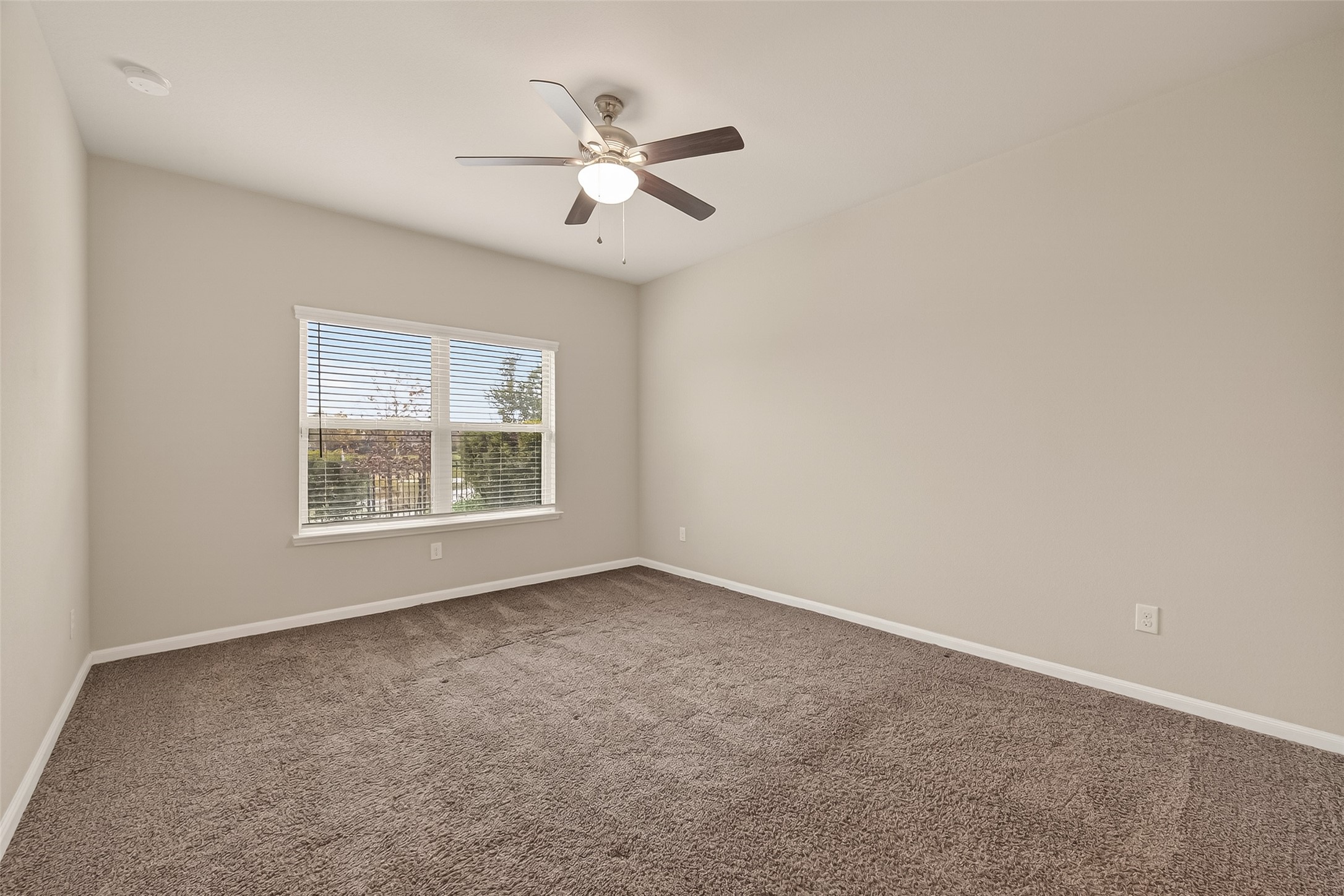 2510 Meerstad Lane Houston, TX 77047 - Photo 34 of 49 an empty room with windows and fan