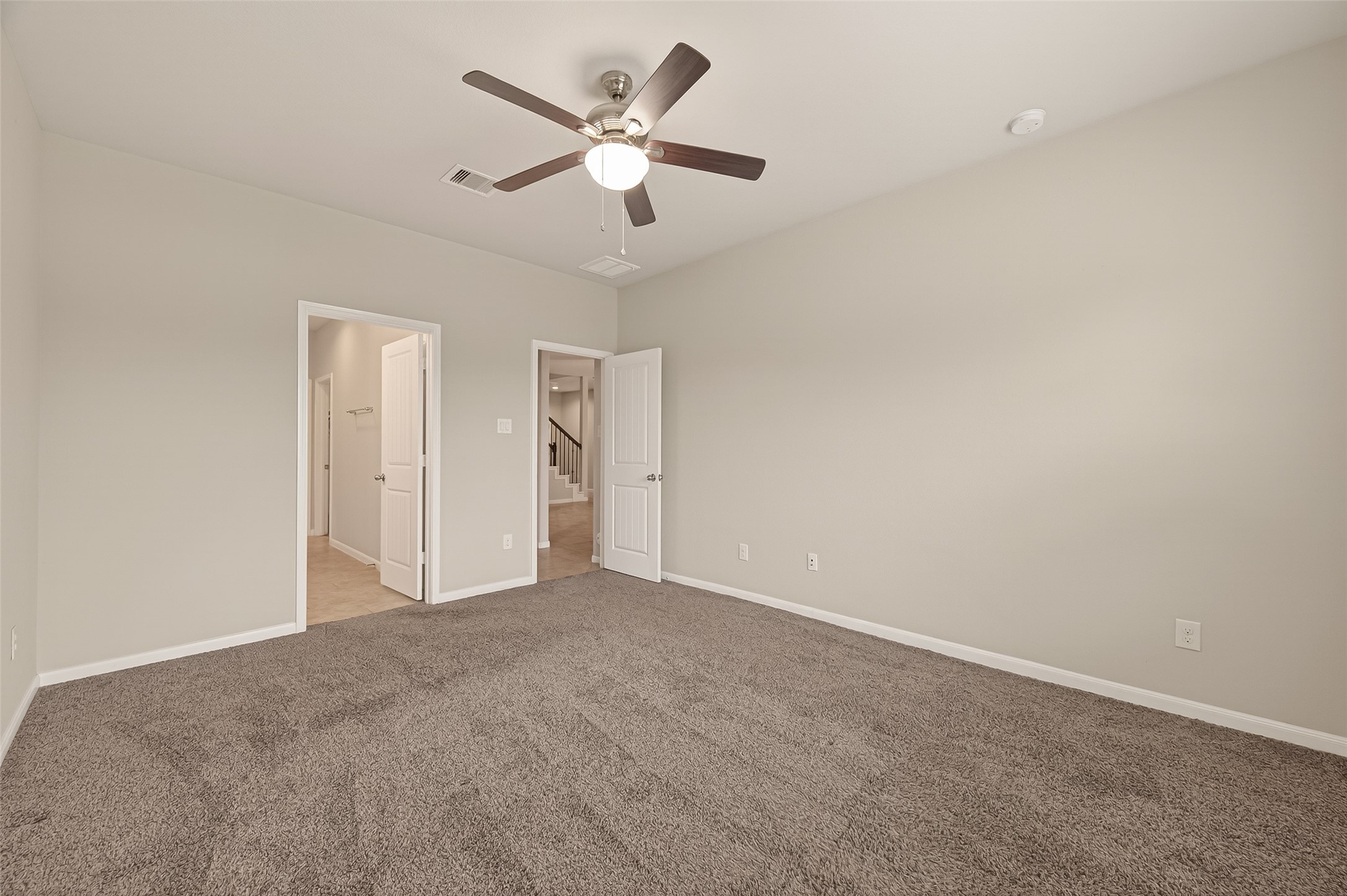 2510 Meerstad Lane Houston, TX 77047 - Photo 36 of 49 an empty room with a ceiling fan and a window