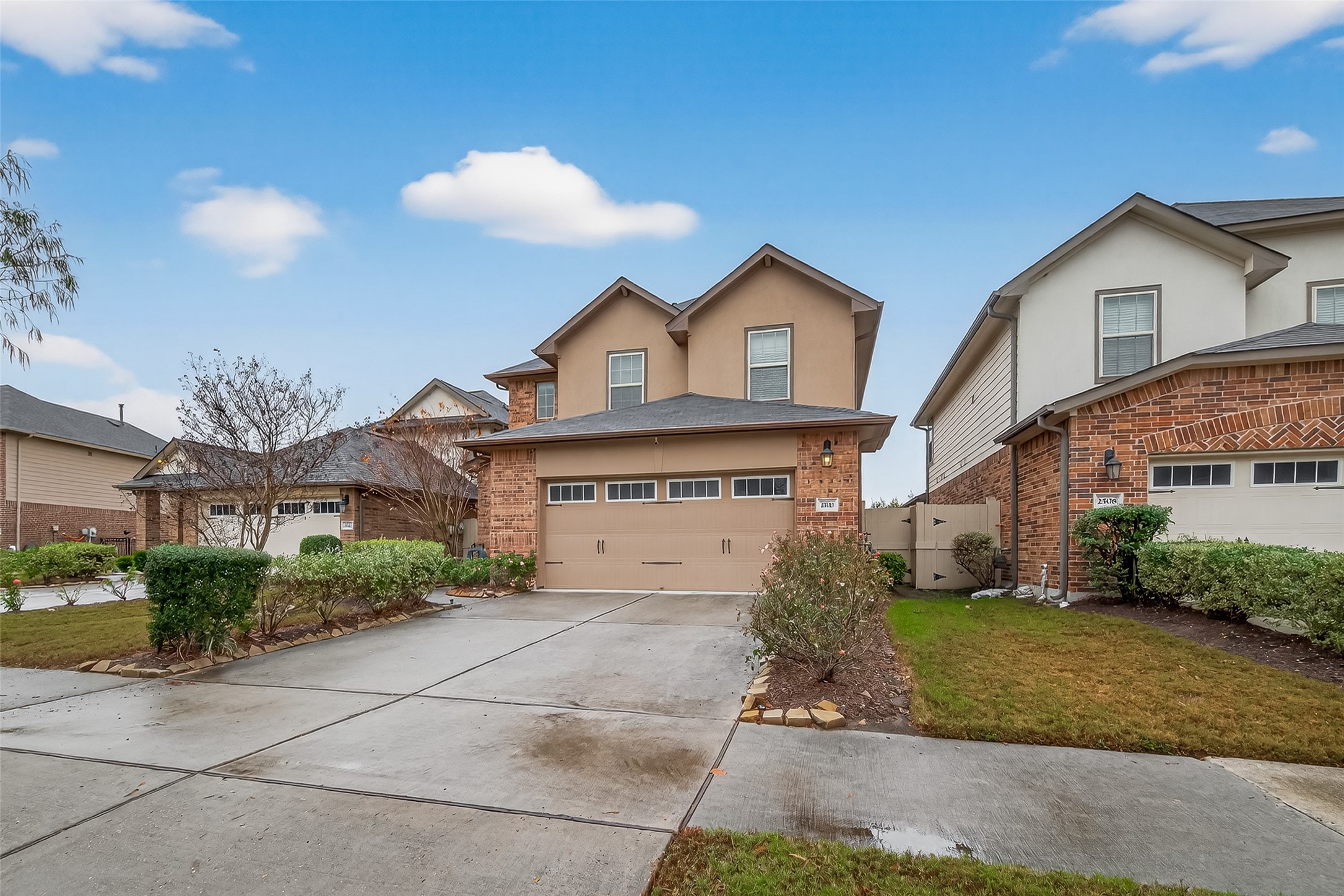 2510 Meerstad Lane Houston, TX 77047 - Photo 5 of 49 a view of a big house with a yard and plants