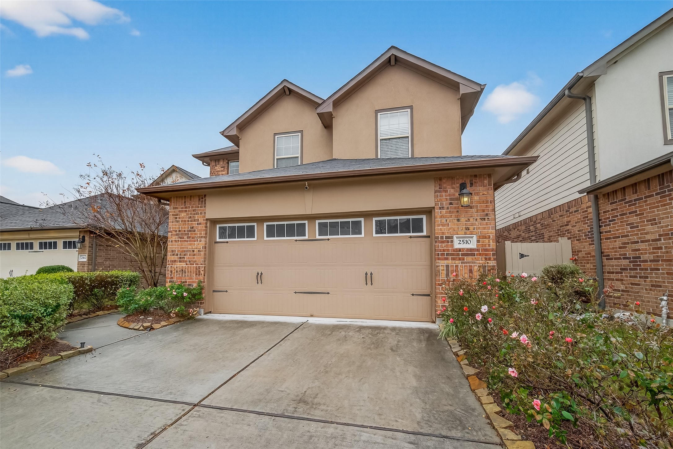 2510 Meerstad Lane Houston, TX 77047 - Photo 6 of 49 a front view of a house with a yard and garage