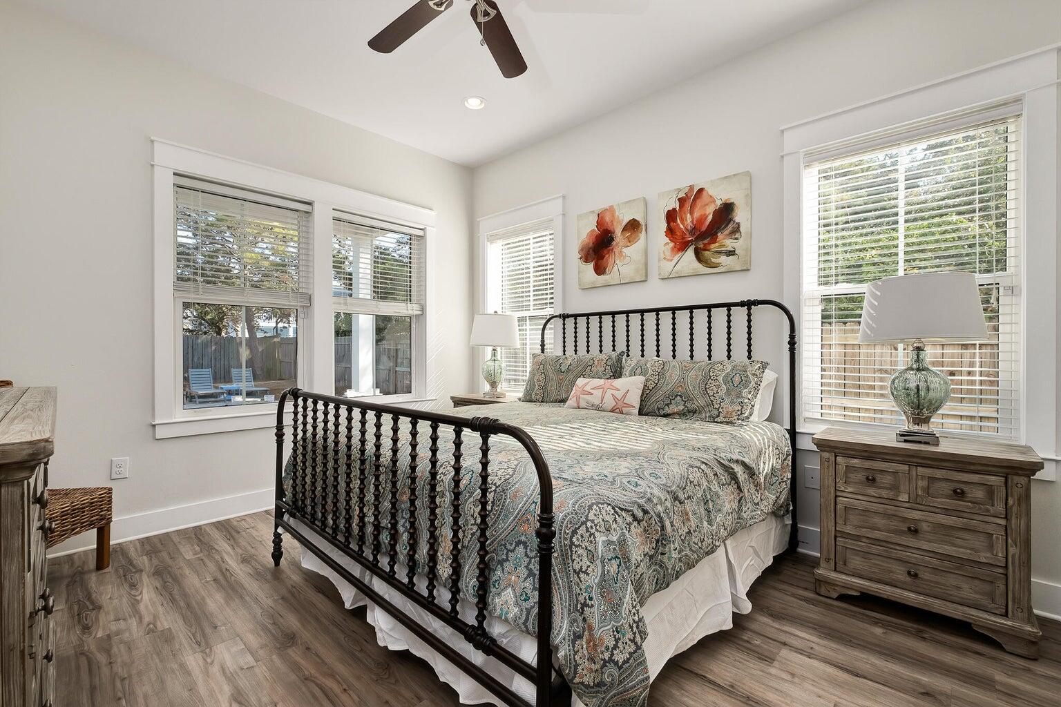 99 Stingray Street Destin, FL 32541 - Photo 14 of 28 a bed sitting in a bedroom next to a window