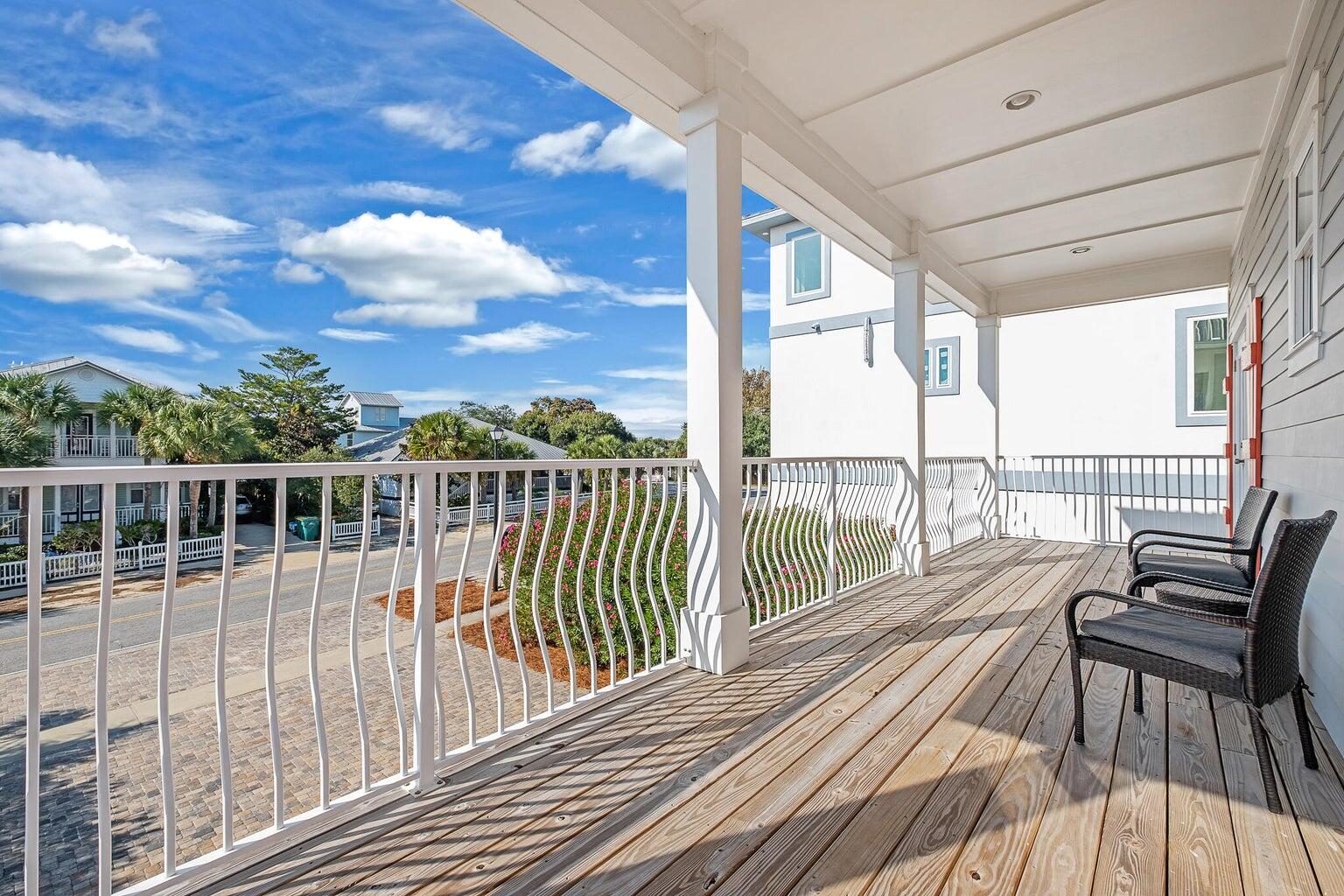 99 Stingray Street Destin, FL 32541 - Photo 28 of 28 a view of balcony with wooden floor and fence