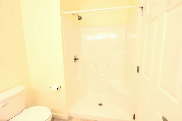 a bathroom with a shower curtain