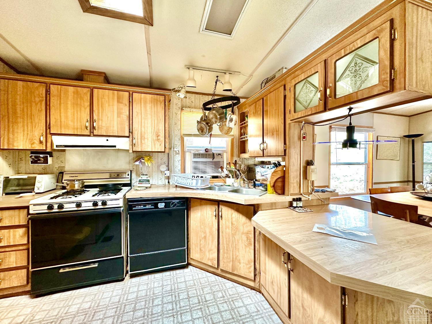 85 Laurel House Road Hunter, NY 12436 - Photo 6 of 20 a kitchen with stainless steel appliances granite countertop a sink stove and cabinets