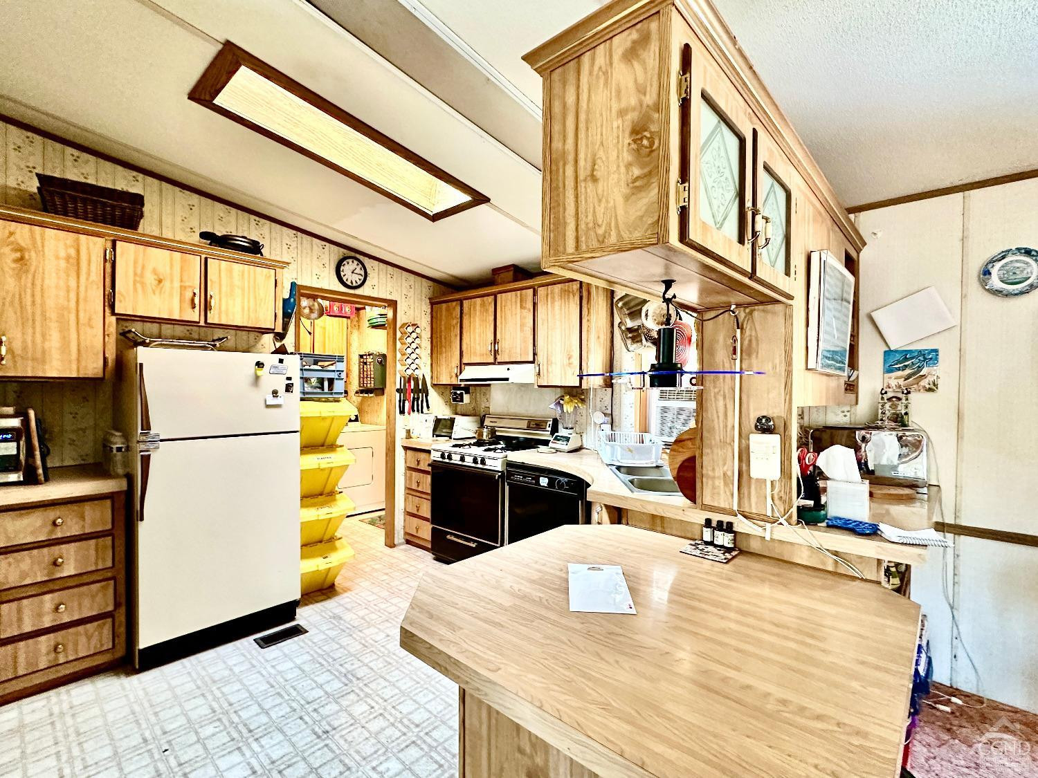 85 Laurel House Road Hunter, NY 12436 - Photo 7 of 20 a kitchen with refrigerator and stove