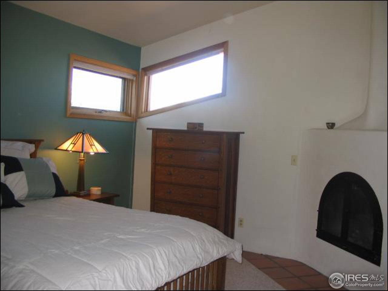 63 Good Friday Road Boulder, CO 80302 - Photo 11 of 12 a bedroom with a bed and a dresser