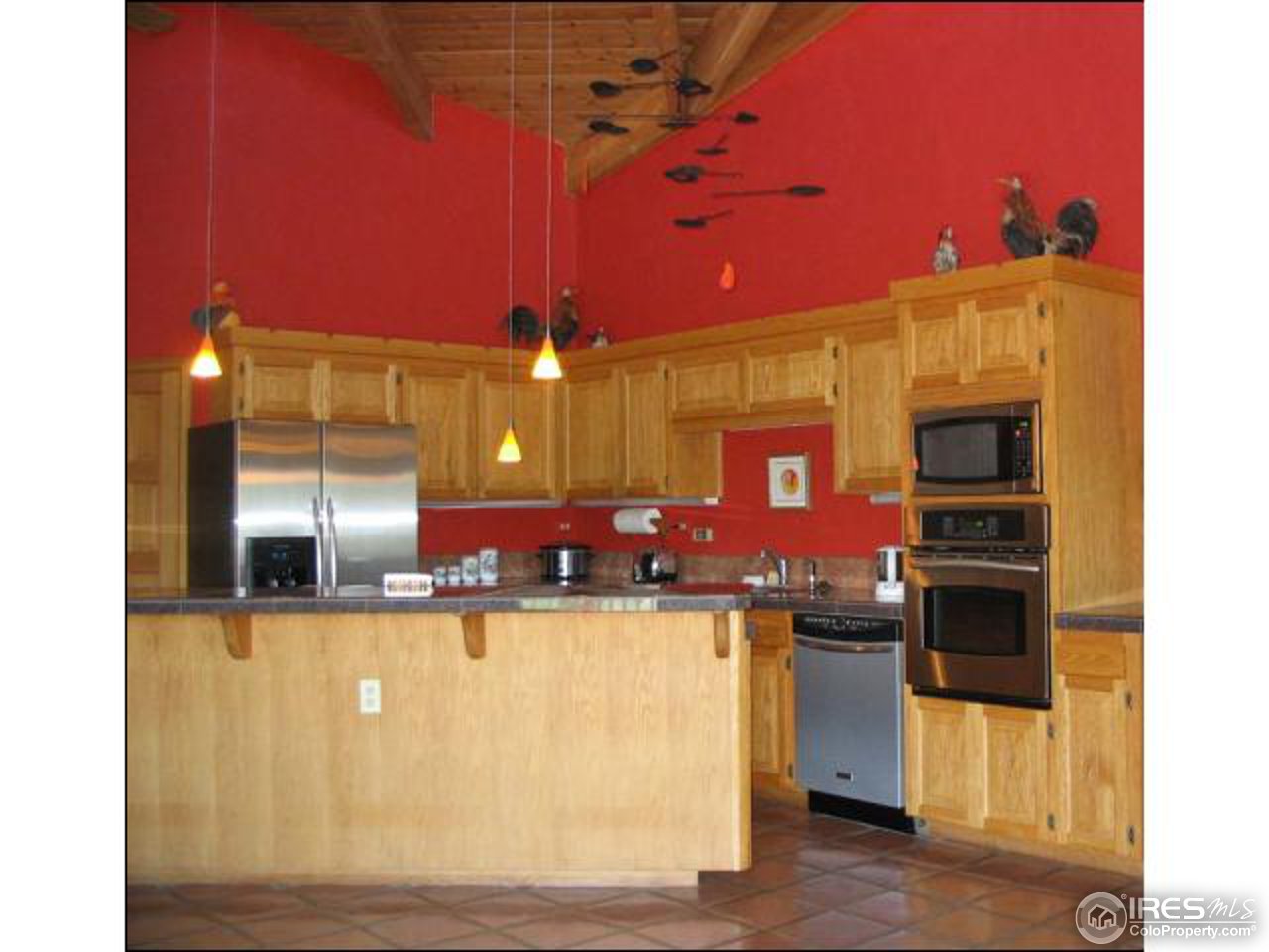 63 Good Friday Road Boulder, CO 80302 - Photo 5 of 12 a kitchen with a sink cabinets and stainless steel appliances