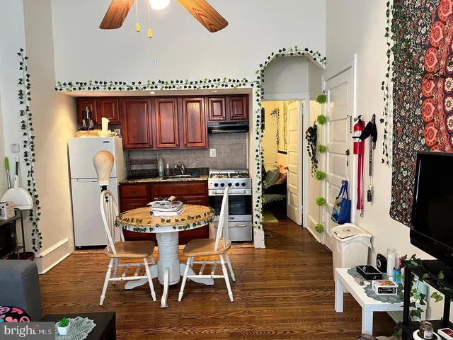 a view of a city street with cars