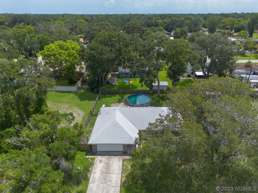 2311 Pine Tree Drive Edgewater, FL 32141 - Photo 26 of 32 an aerial view of a house