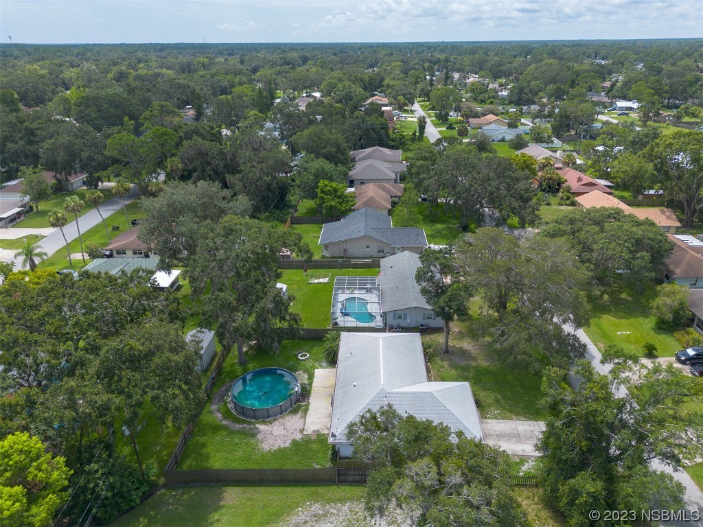 2311 Pine Tree Drive Edgewater, FL 32141 - Photo 31 of 32 an aerial view of multiple house