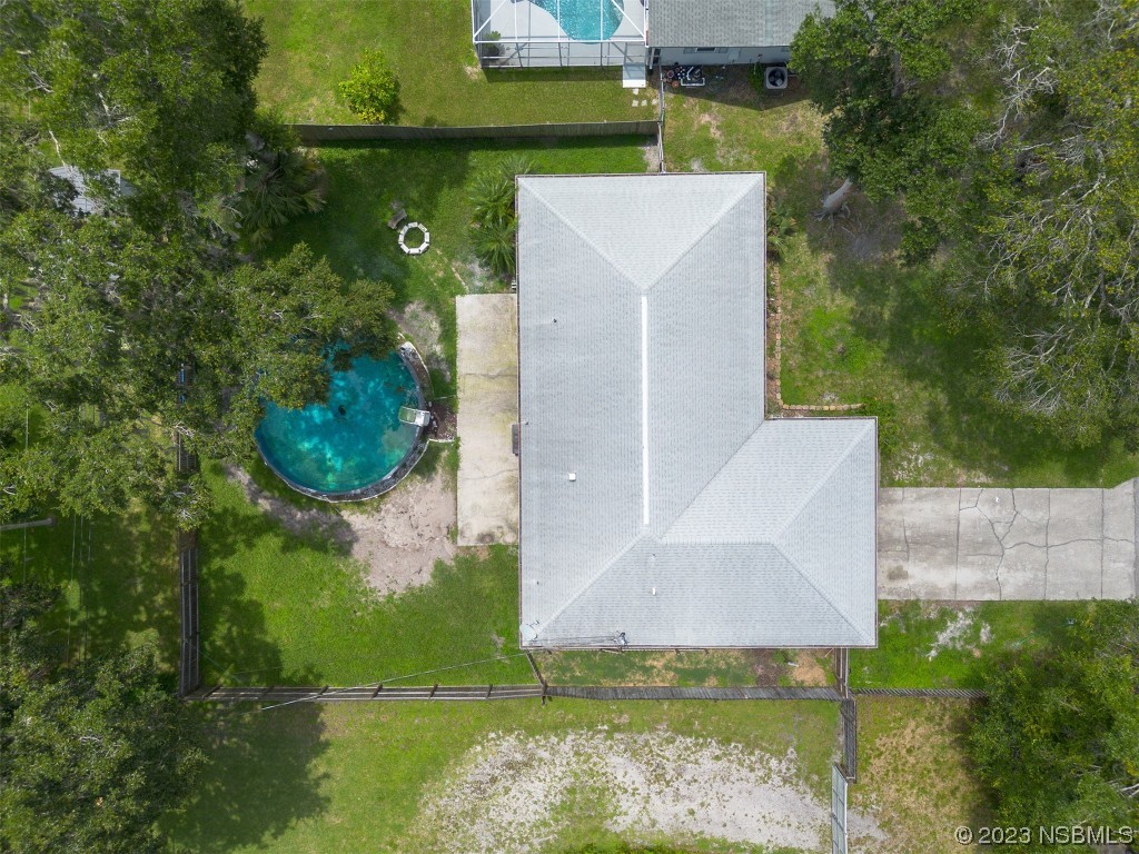 2311 Pine Tree Drive Edgewater, FL 32141 - Photo 32 of 32 an aerial view of a house having yard
