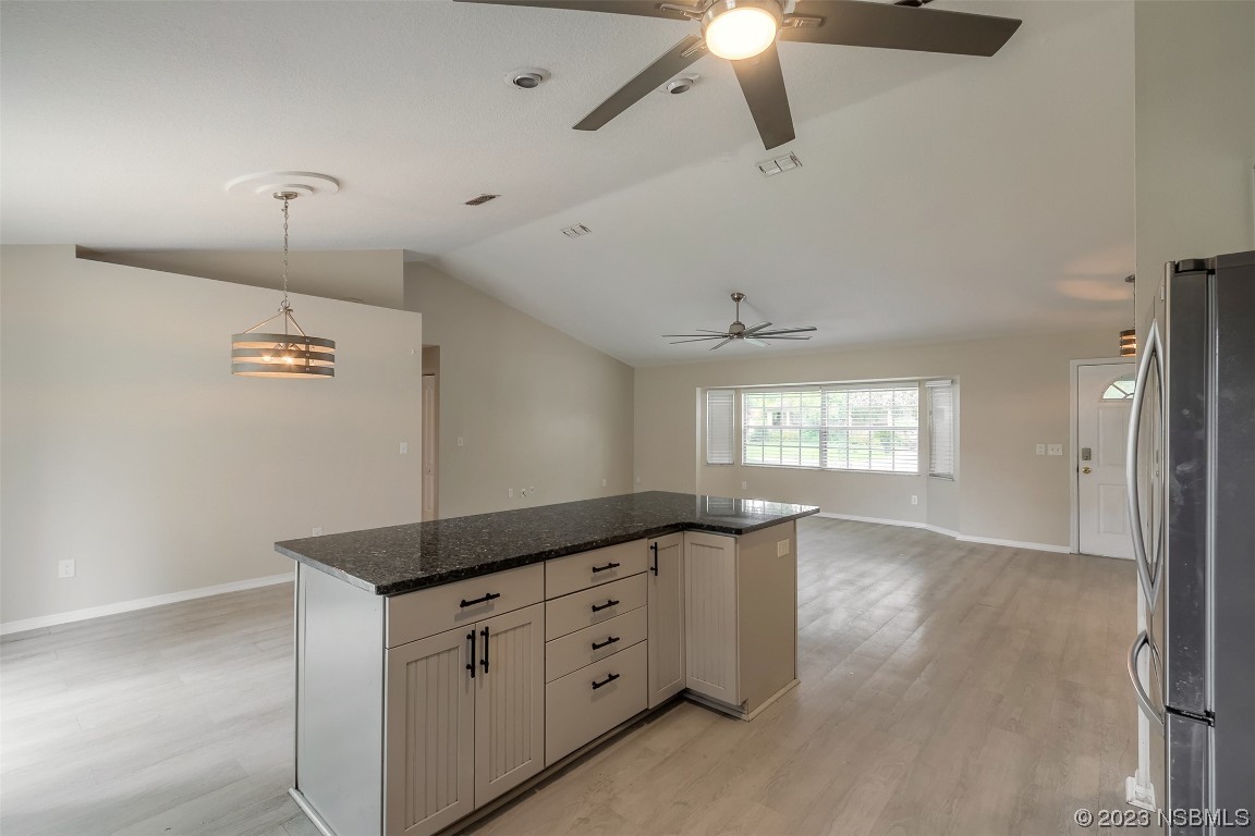 2311 Pine Tree Drive Edgewater, FL 32141 - Photo 10 of 32 a view of a windows and chandelier in a room