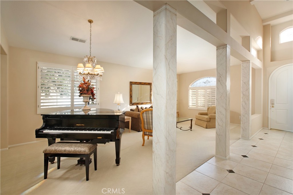 25119 Smokewood Way Stevenson Ranch, CA 91381 - Photo 9 of 36 Formal Dining area being used for a piano