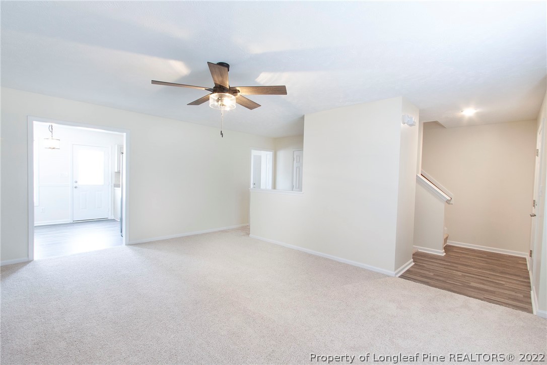 215 Cape Fear Road Raeford, NC 28376 - Photo 2 of 24 a view of a big room with carpet
