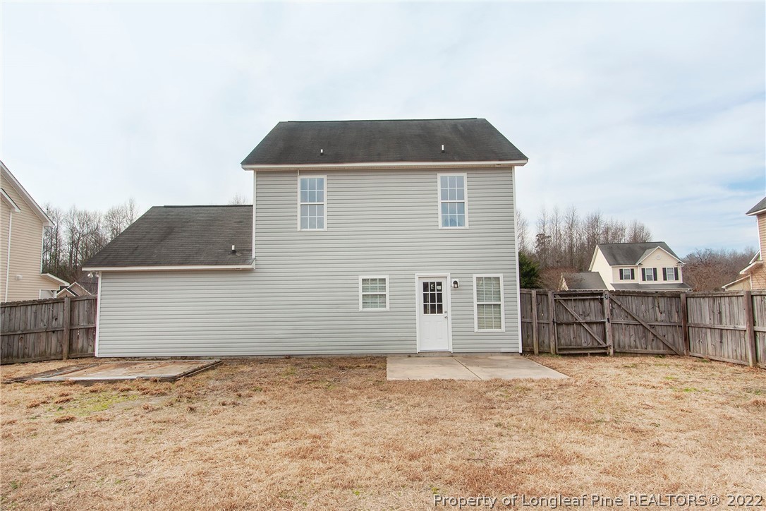 215 Cape Fear Road Raeford, NC 28376 - Photo 23 of 24 a front view of a house with a yard