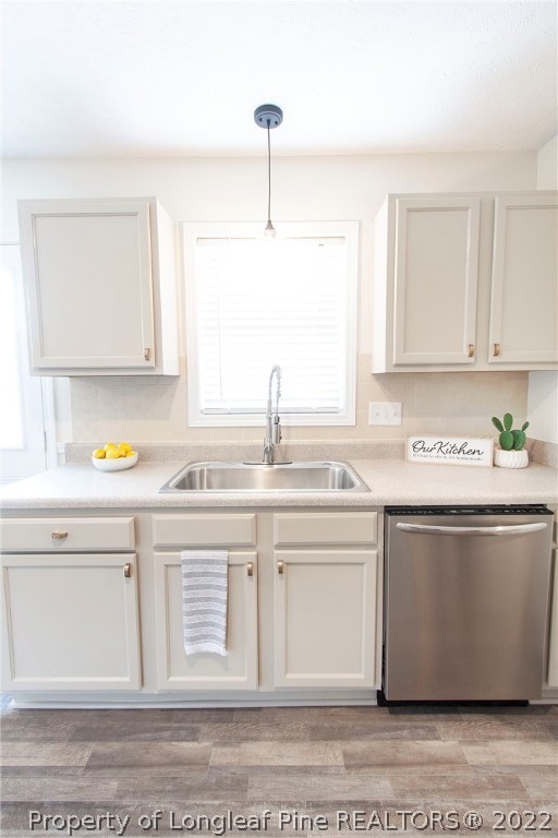 215 Cape Fear Road Raeford, NC 28376 - Photo 9 of 24 a kitchen with stainless steel appliances granite countertop a sink a stove cabinets and a window