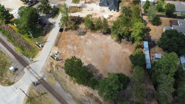 an aerial view of residential house with outdoor space