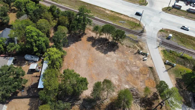 an aerial view of a house a yard