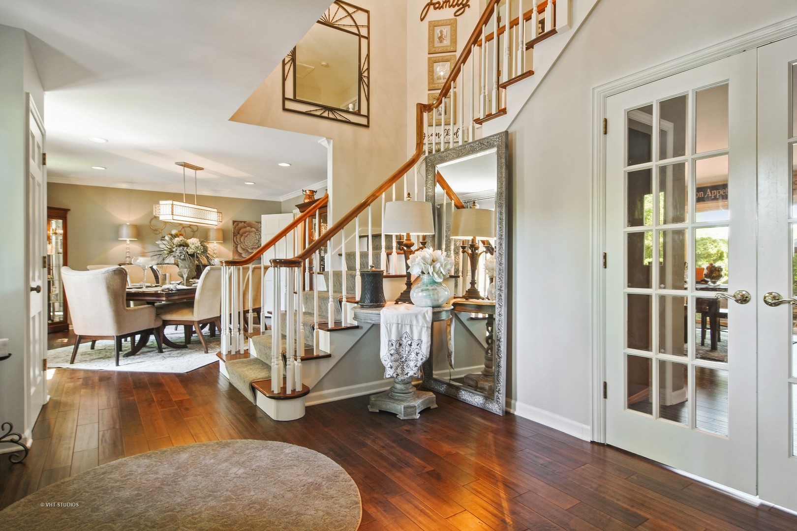 20755 North Weatherstone Road Kildeer, IL 60047 - Photo 3 of 61 a view of an entryway with wooden floor and a livingroom view