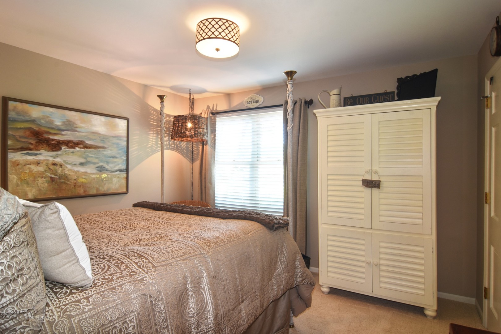 20755 North Weatherstone Road Kildeer, IL 60047 - Photo 24 of 61 a bedroom with a bed and a painting on the wall