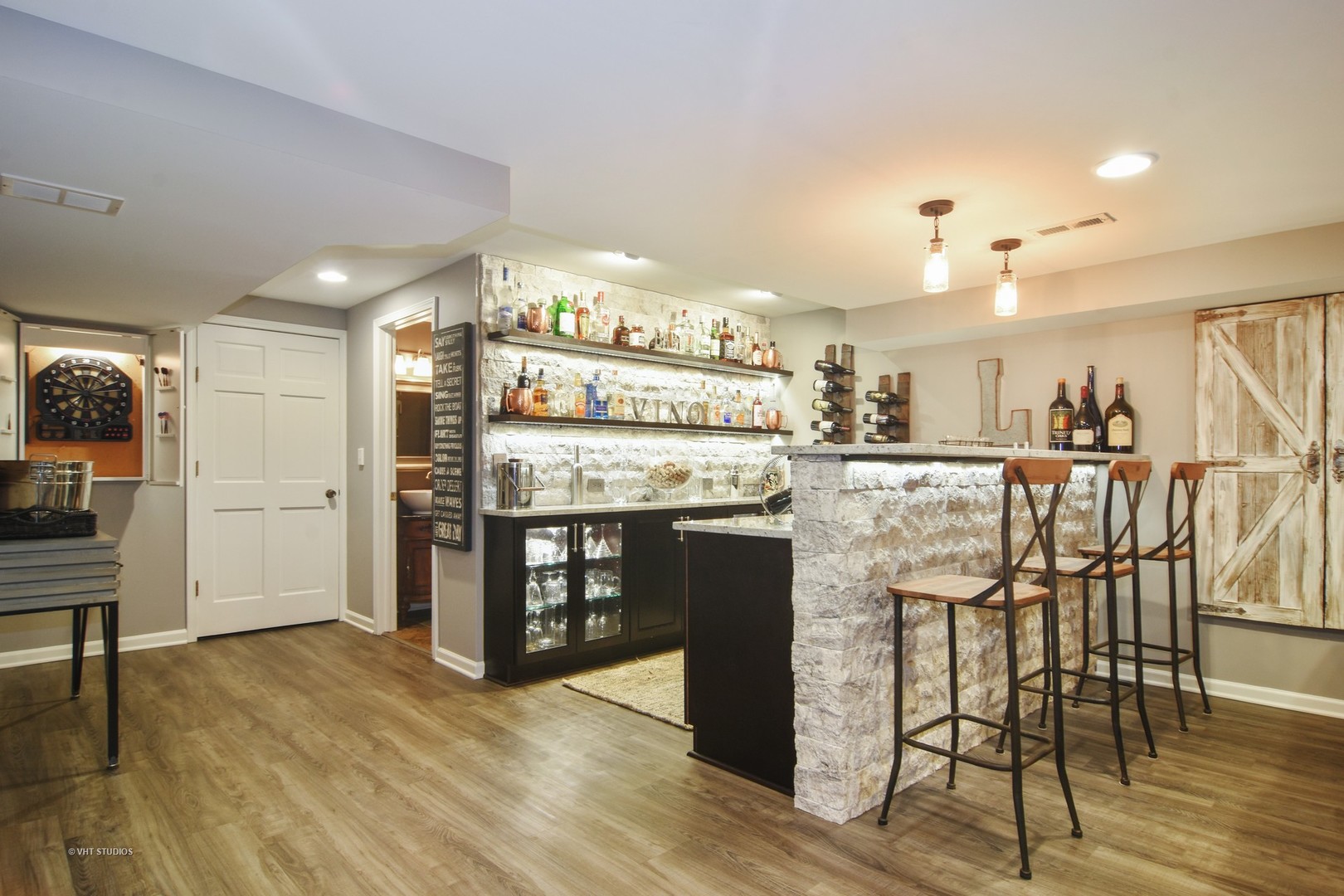 20755 North Weatherstone Road Kildeer, IL 60047 - Photo 29 of 61 a kitchen with stainless steel appliances kitchen island granite countertop a table chairs and a refrigerator