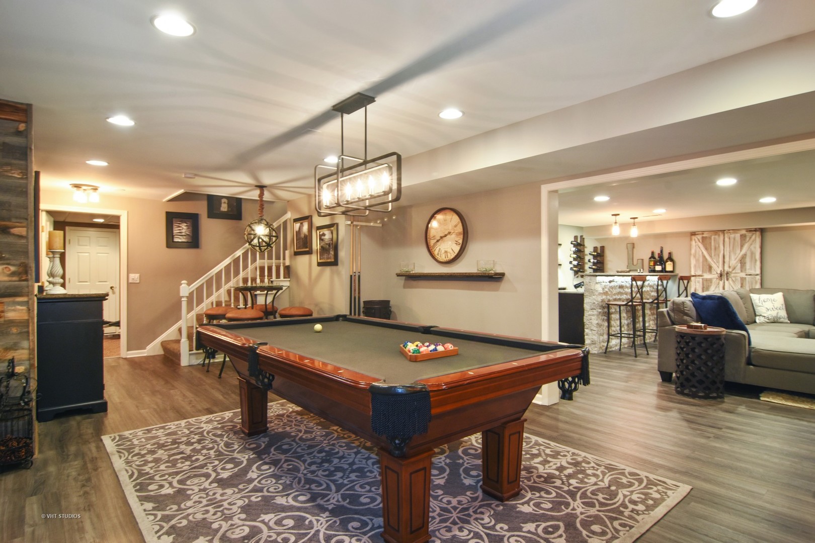 20755 North Weatherstone Road Kildeer, IL 60047 - Photo 32 of 61 a living room with furniture a table and kitchen view
