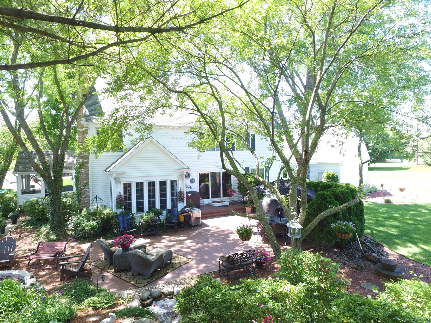 20755 North Weatherstone Road Kildeer, IL 60047 - Photo 50 of 61 a front view of a house with garden