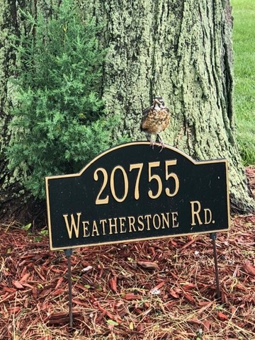 20755 North Weatherstone Road Kildeer, IL 60047 - Photo 57 of 61 a sign broad on the side of the road