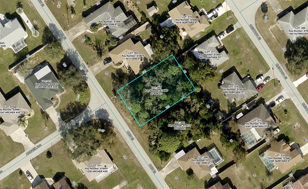 4404 Odin Street Spring Hill, FL 34608 - Photo 1 of 1 an aerial view of multiple houses with yard