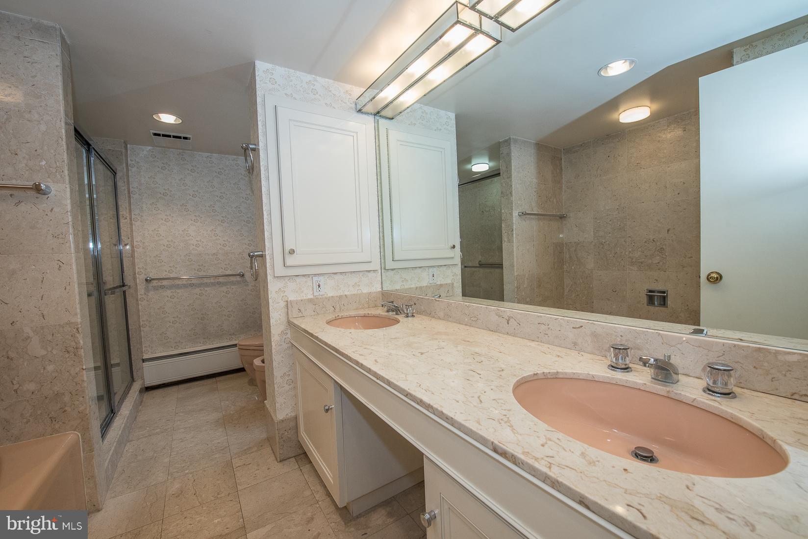 39 Fairview Road Penn Valley, PA 19072 - Photo 15 of 20 a bathroom with a granite countertop sink mirror and shower