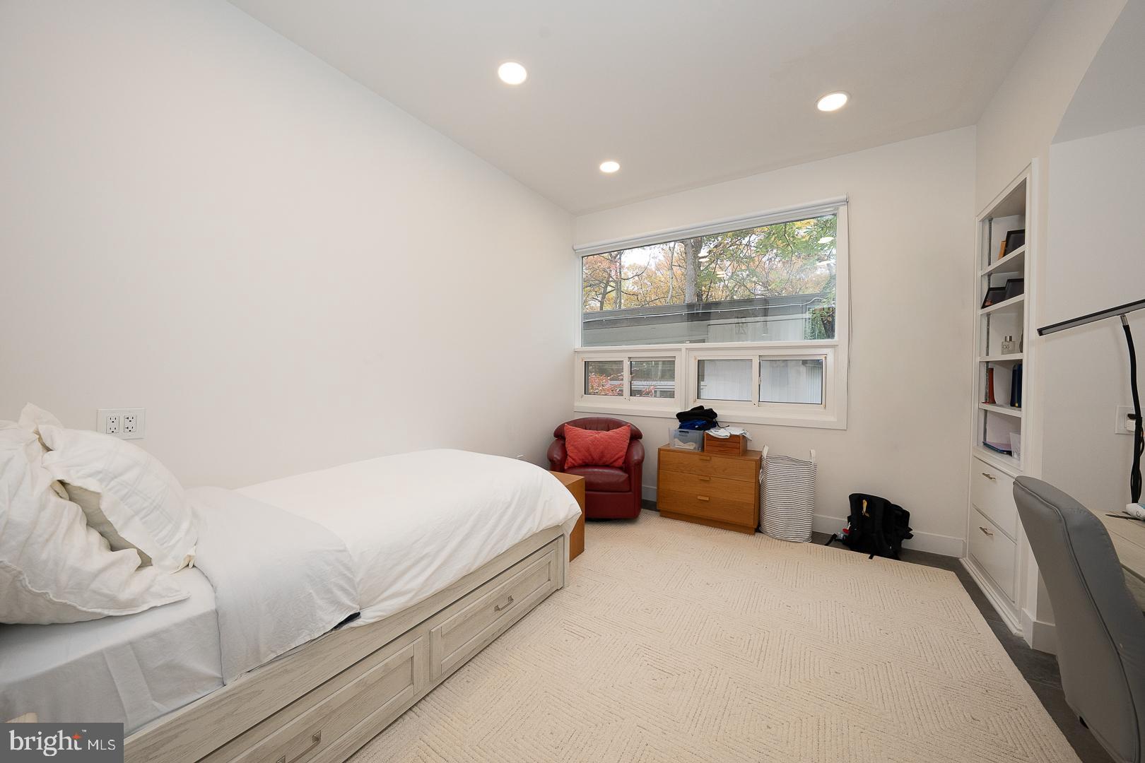 39 Fairview Road Penn Valley, PA 19072 - Photo 16 of 20 a bedroom with a bed and glass window