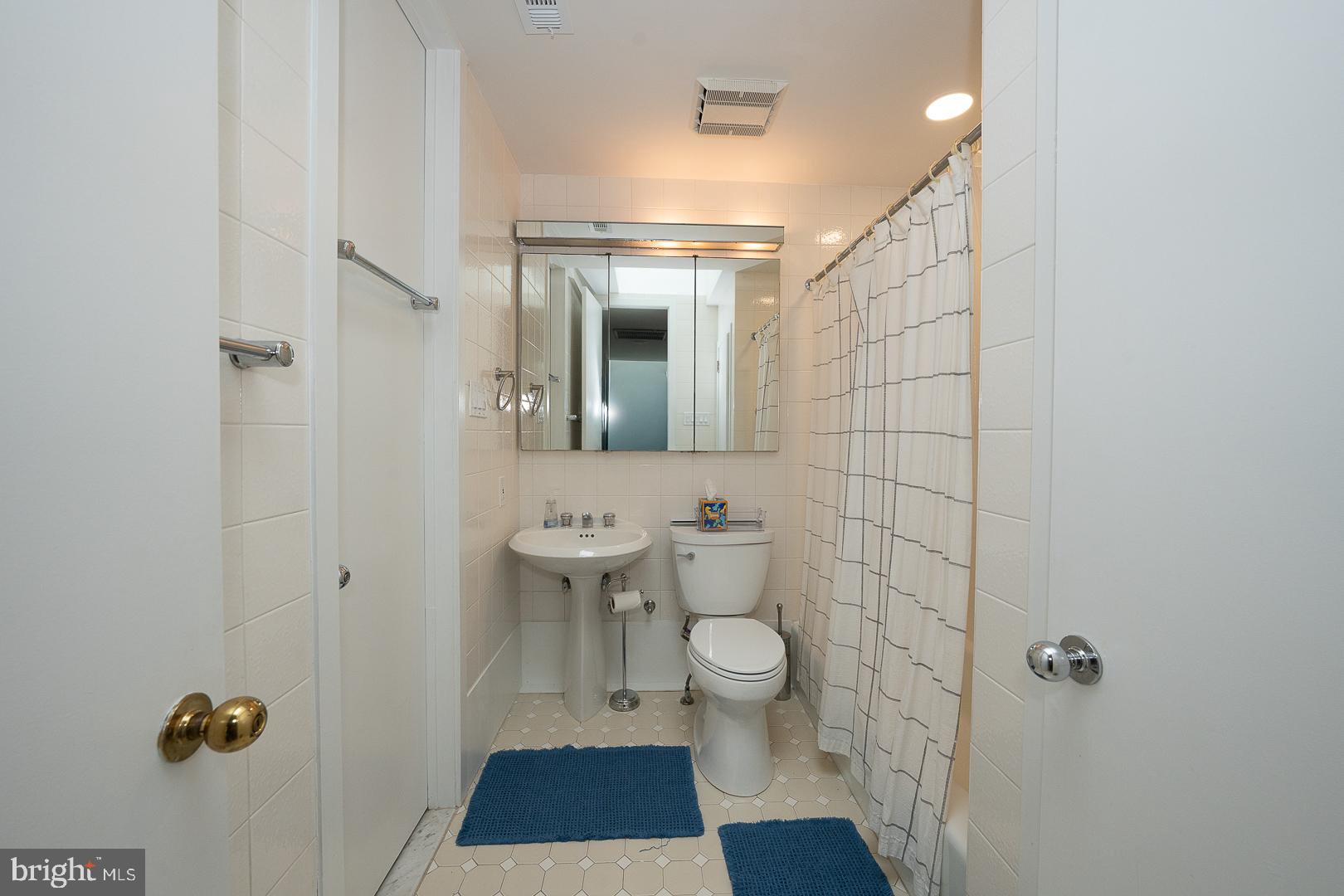 39 Fairview Road Penn Valley, PA 19072 - Photo 17 of 20 a bathroom with a sink toilet and shower