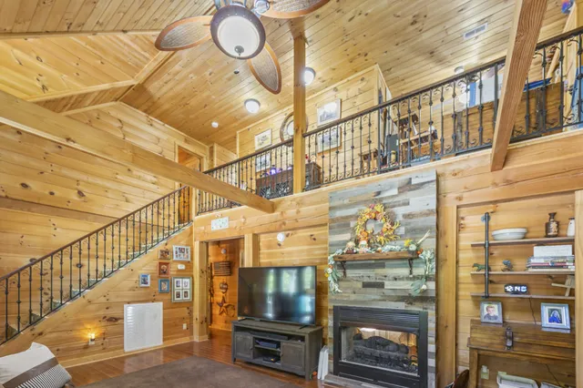 a kitchen with a stove and a fireplace