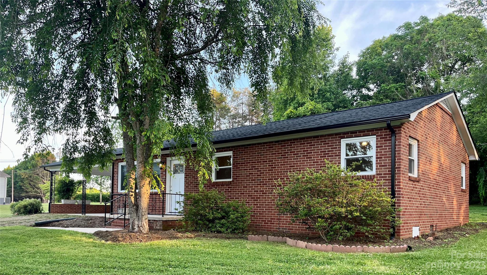 35 Circle Loop Stony Point, NC 28678 - Photo 1 of 46 a front view of a house with garden