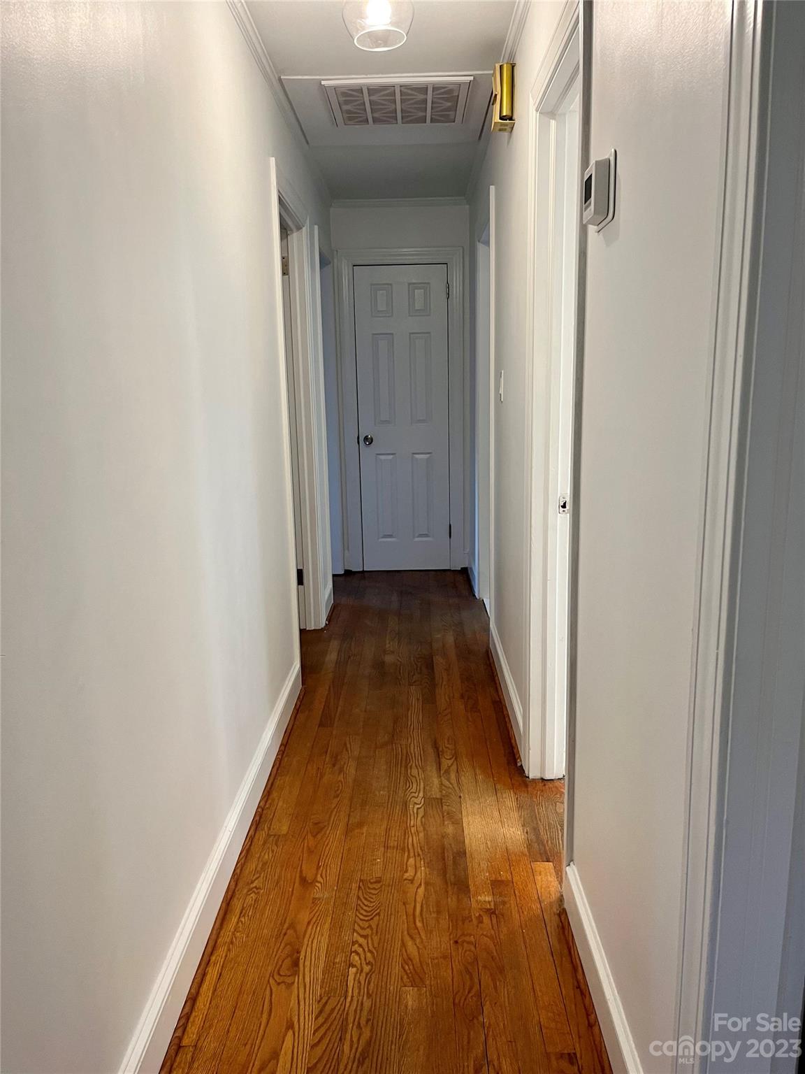35 Circle Loop Stony Point, NC 28678 - Photo 34 of 46 a view of a hallway with wooden floor
