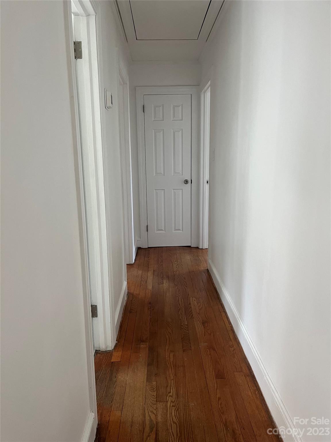 35 Circle Loop Stony Point, NC 28678 - Photo 39 of 46 a view of a hallway with wooden floor