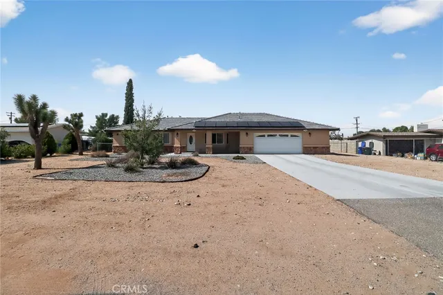 a view of a house with a swimming pool