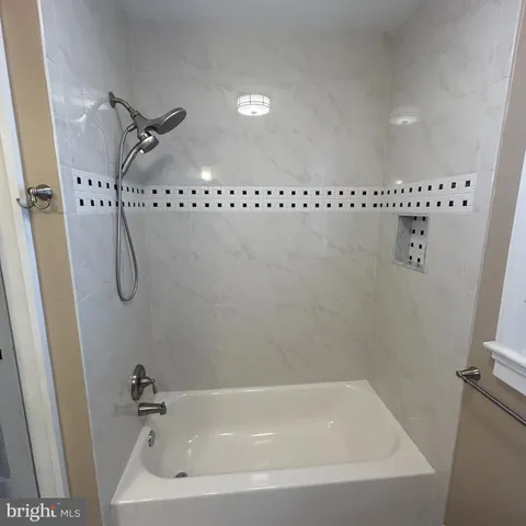 a bathroom with a bathtub