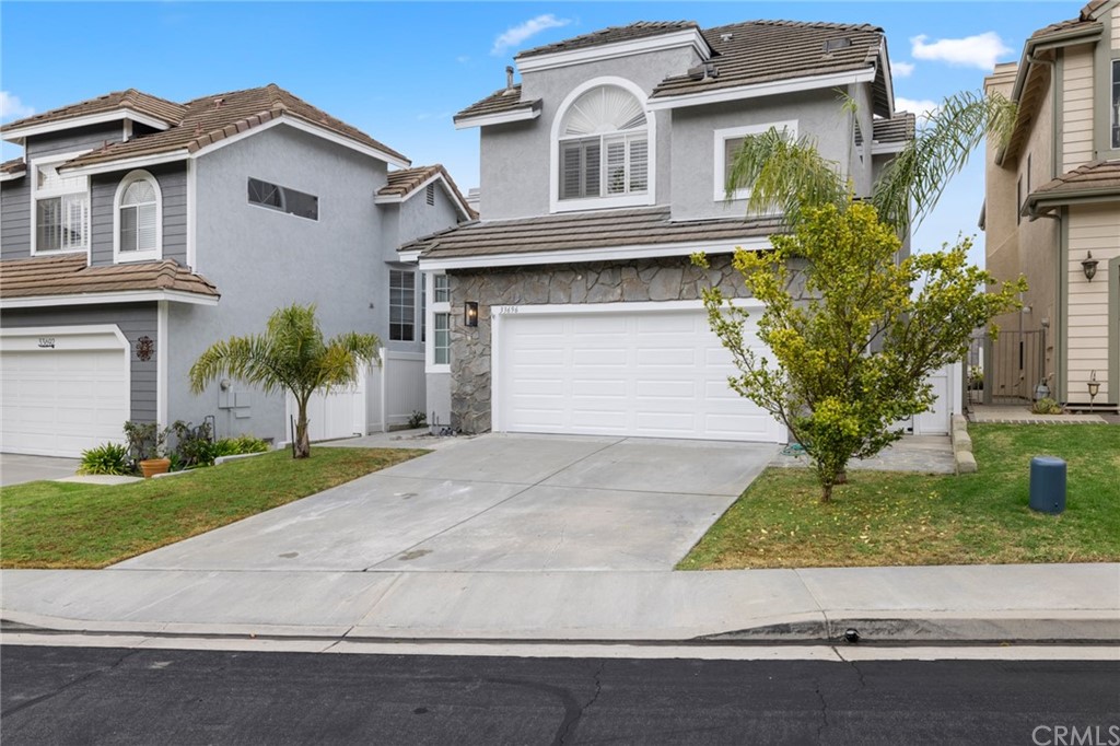 33696 Bridgehampton Drive Dana Point, CA 92629 - Photo 1 of 20 a front view of a house with garden