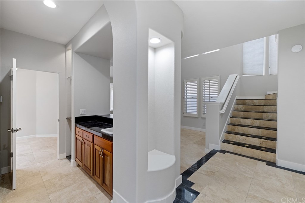 33696 Bridgehampton Drive Dana Point, CA 92629 - Photo 11 of 20 a view of a hallway with entryway and stairs