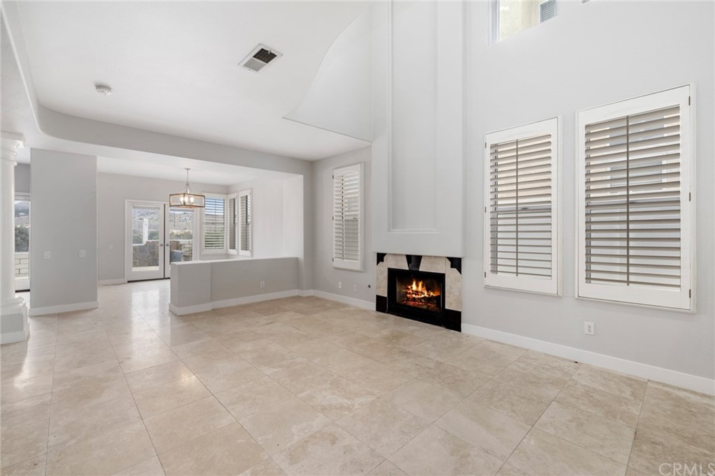 33696 Bridgehampton Drive Dana Point, CA 92629 - Photo 4 of 20 a view of livingroom with furniture and fireplace
