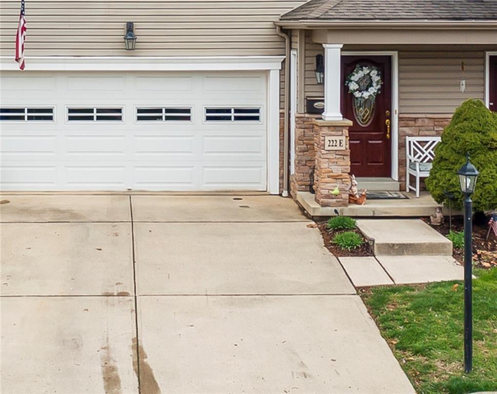 222 Arch Street, Unit E Verona, PA 15147 - Photo 1 of 24 a front view of a house with garden