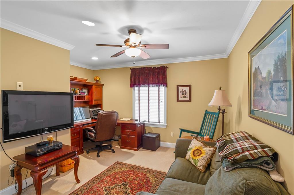 222 Arch Street, Unit E Verona, PA 15147 - Photo 16 of 24 a view of a livingroom with workspace and a window