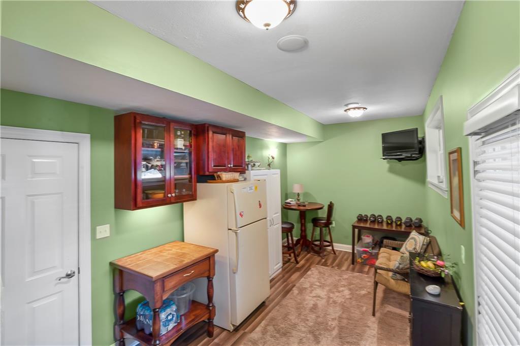 222 Arch Street, Unit E Verona, PA 15147 - Photo 19 of 24 a storage room with cabinets
