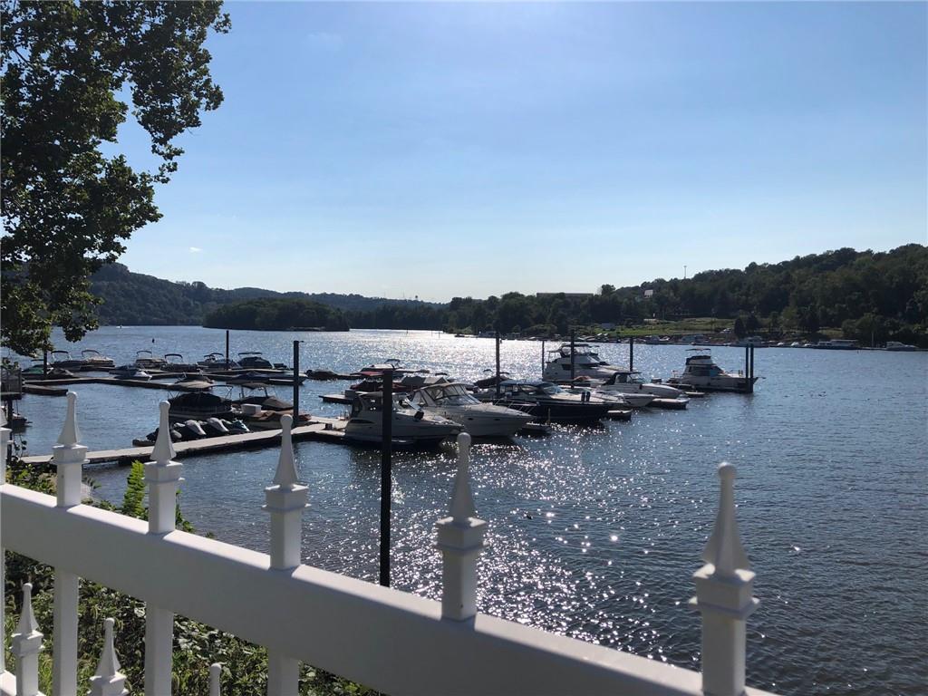 222 Arch Street, Unit E Verona, PA 15147 - Photo 21 of 24 a view of a lake with houses