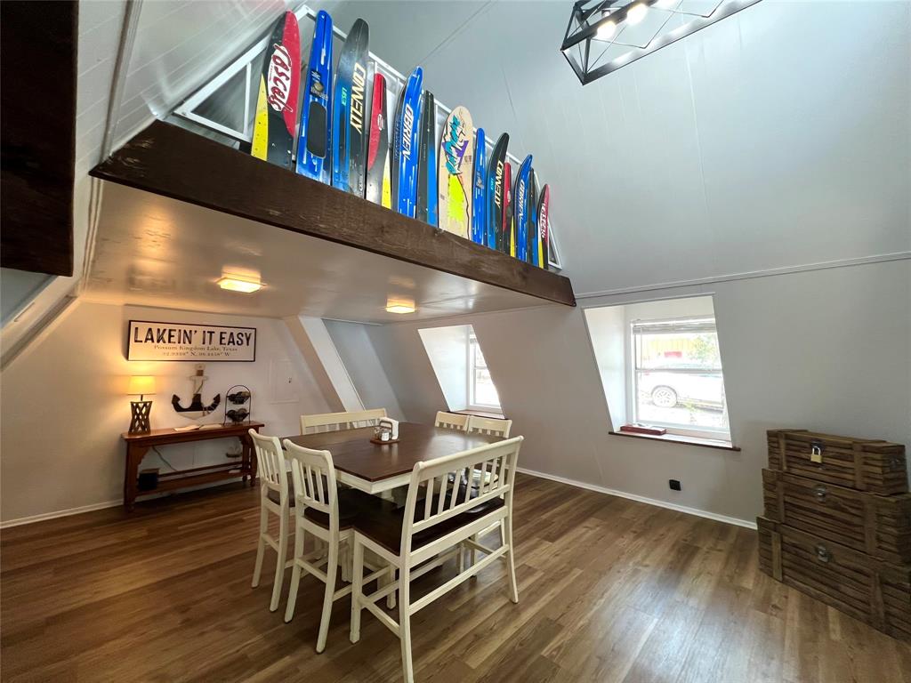 3817 Blue Fin Road Caddo, TX 76429 - Photo 12 of 40 a living room with furniture and a book shelf