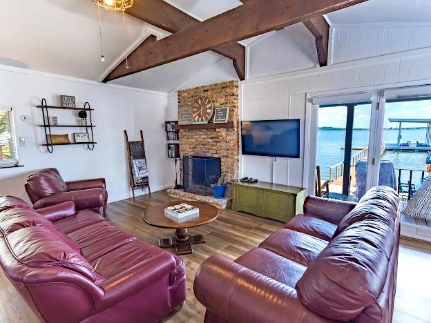 3817 Blue Fin Road Caddo, TX 76429 - Photo 18 of 40 a living room with furniture and a fireplace