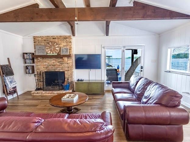3817 Blue Fin Road Caddo, TX 76429 - Photo 19 of 40 a living room with furniture and a fireplace